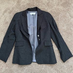Black Blazer with shoulder pads. Brand Tahari